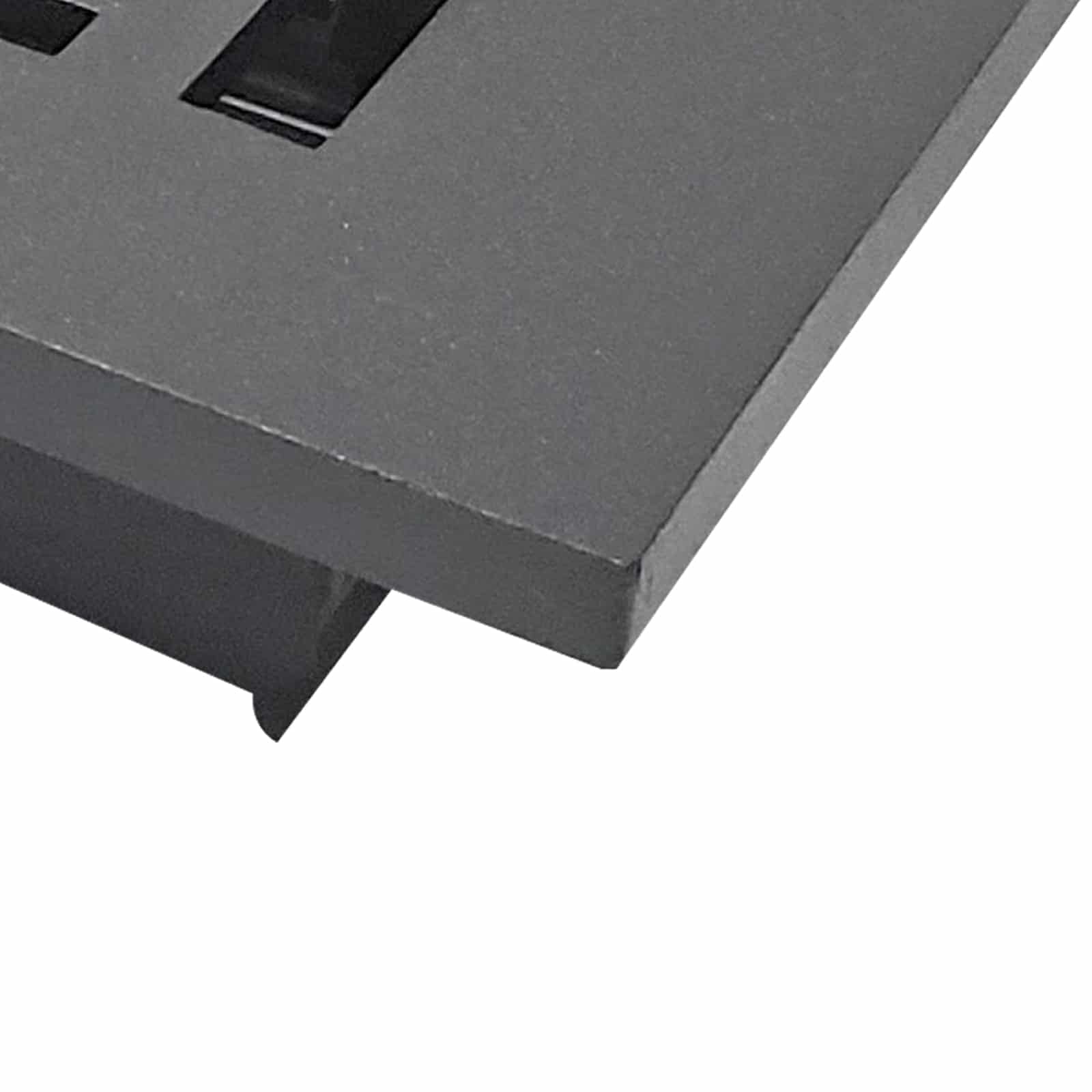 Close-up of a Prima Decorative Hardware gray cast aluminum vent with rectangular slots, showing the corner and edge against a white background.
