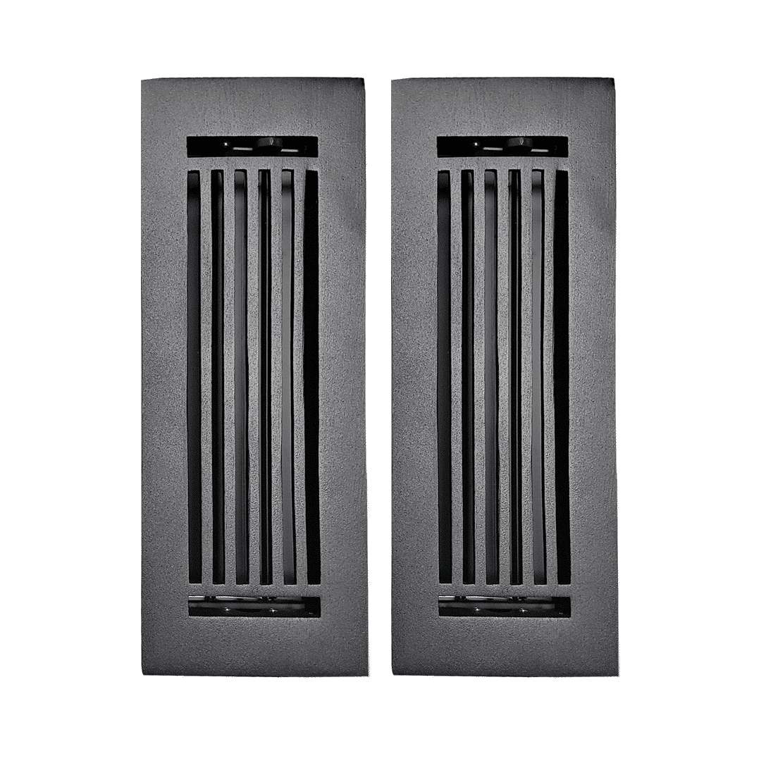 Two rectangular black cast aluminum vents from Prima Decorative Hardware, featuring vertical slats, are placed side by side on a white background, highlighting their modern linear floor register design.