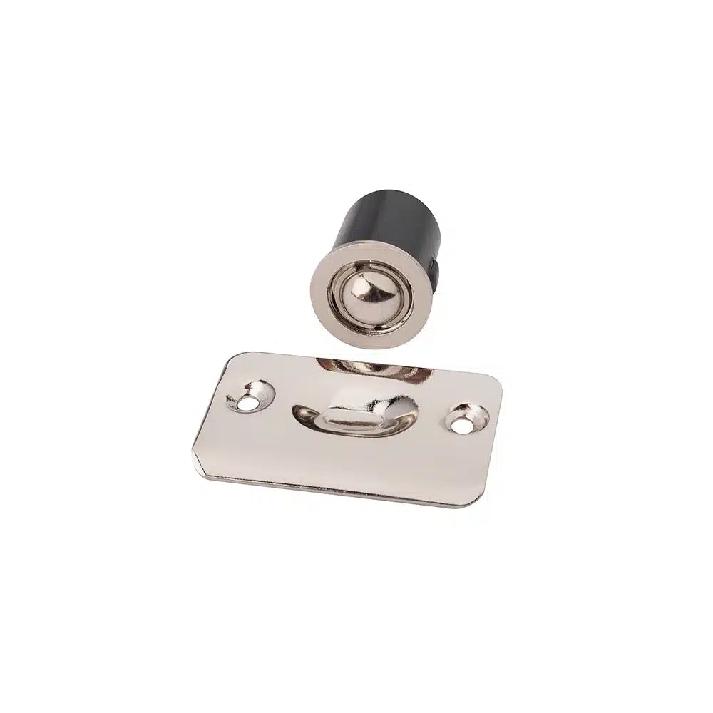 The Taymor Industries metal ball catch latch features a zinc diecast body, cylindrical spring-loaded ball, and shiny silver rectangular strike plate for adjustable door gaps, shown on a white background.