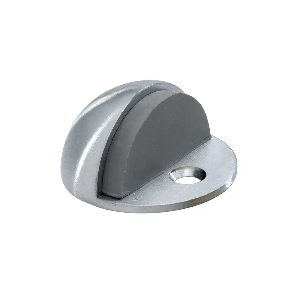 A Taymor Industries silver zinc die-cast dome door stop with a flat base, rubber bumper, and single screw floor mounting hole, isolated on white background.