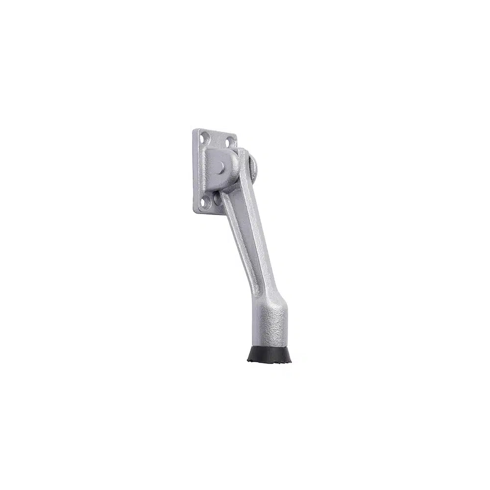 A Taymor Industries silver cast iron door stopper with a black rubber tip, rectangular base with four screw holes, and included mounting screws, shown isolated on a white background.