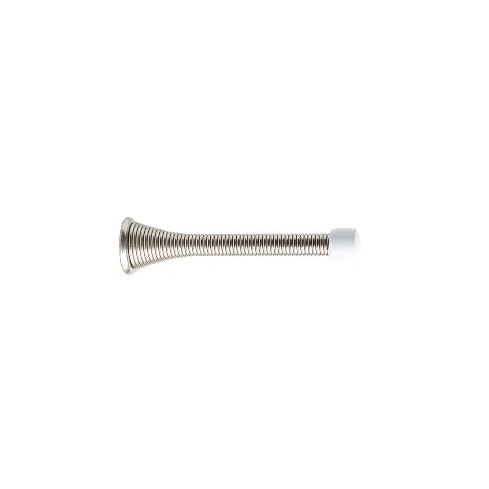 A Taymor Industries metal spring doorstop features a 24mm diameter steel spring wire, wide left base, and white rubber tip on the right, shown isolated on a white background.