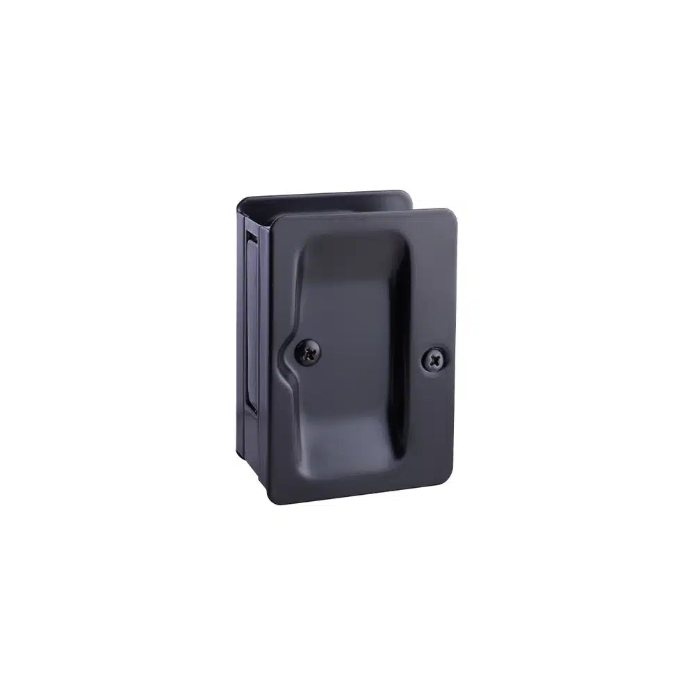 Black rectangular recessed door handle by Taymor Industries, featuring two visible screws for flush mounting on sliding or pocket doors, photographed on a white background.