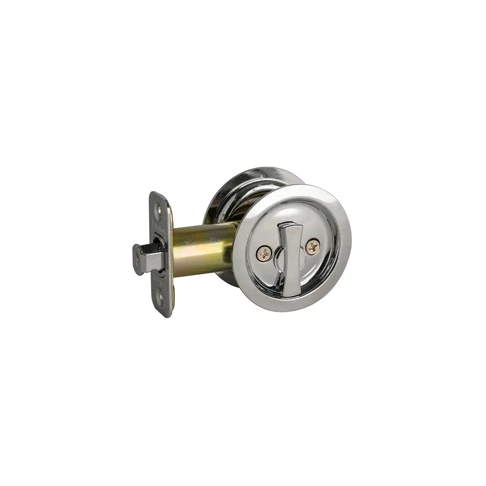 The Taymor Industries pocket door lock is round, silver, and features a thumb turn with a radius corner latch mechanism, shown isolated on a white background.
