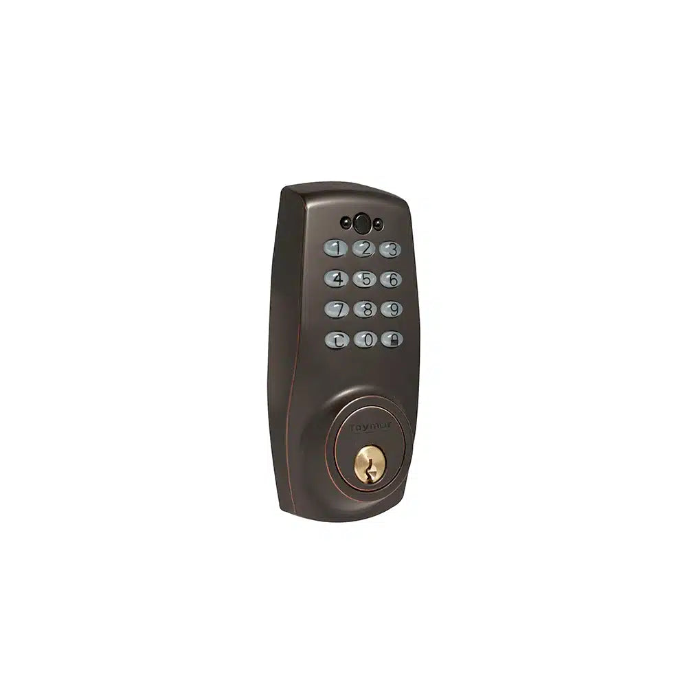 A Taymor Industries bronze electronic door lock with a numeric keypad, traditional key slot below, and motorized deadbolt, isolated on a white background.