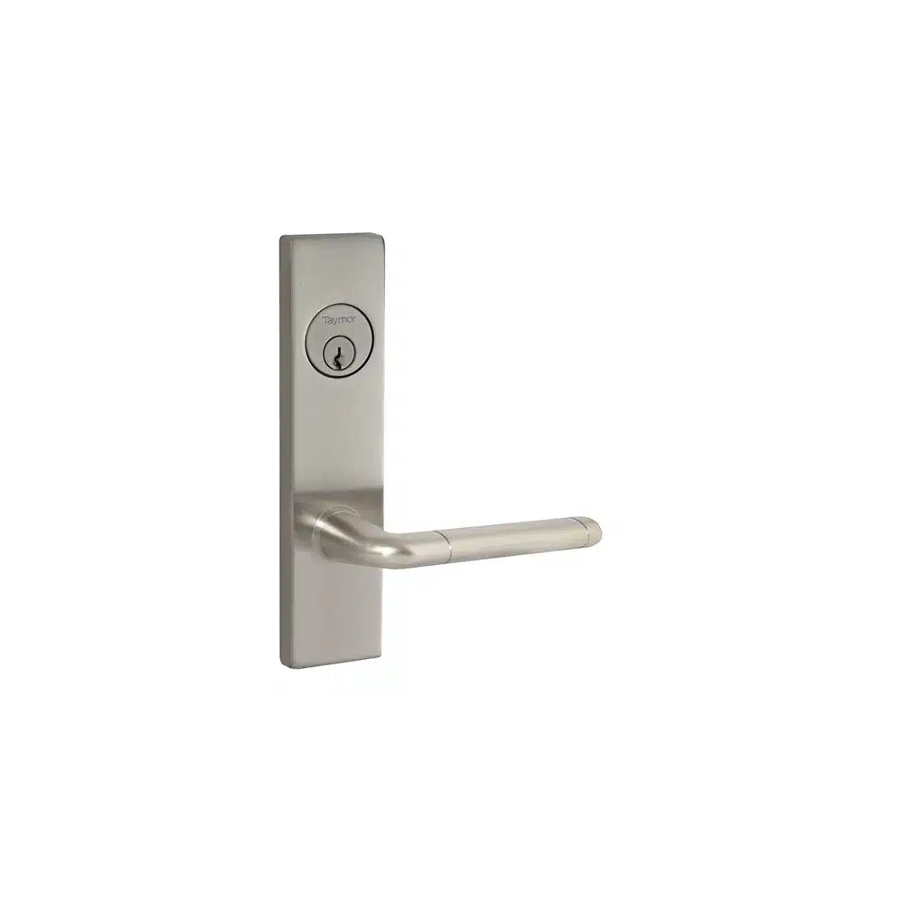 The Taymor Industries brushed metal door handle features a rectangular backplate, cylindrical horizontal lever, a keyhole above the handle, and an SC1 6-pin keyway for secure fire door locking.