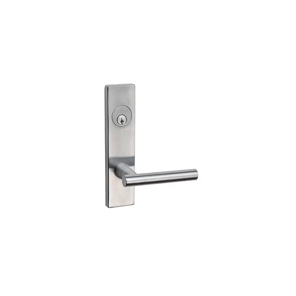 Taymor Industries silver metal door handle with rectangular backplate and built-in 6-pin keyhole lock, shown on a white background. Ideal as a fire door lock, it features a heavy-duty steel case for enhanced security.