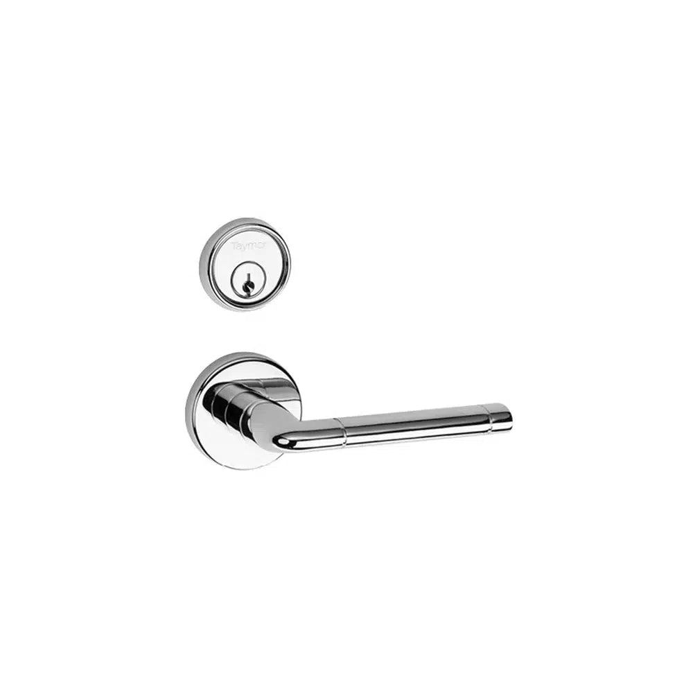 A modern Taymor Industries chrome door handle with a matching round fire door lock featuring an SC1 6-pin keyway above it, both mounted on a white background.