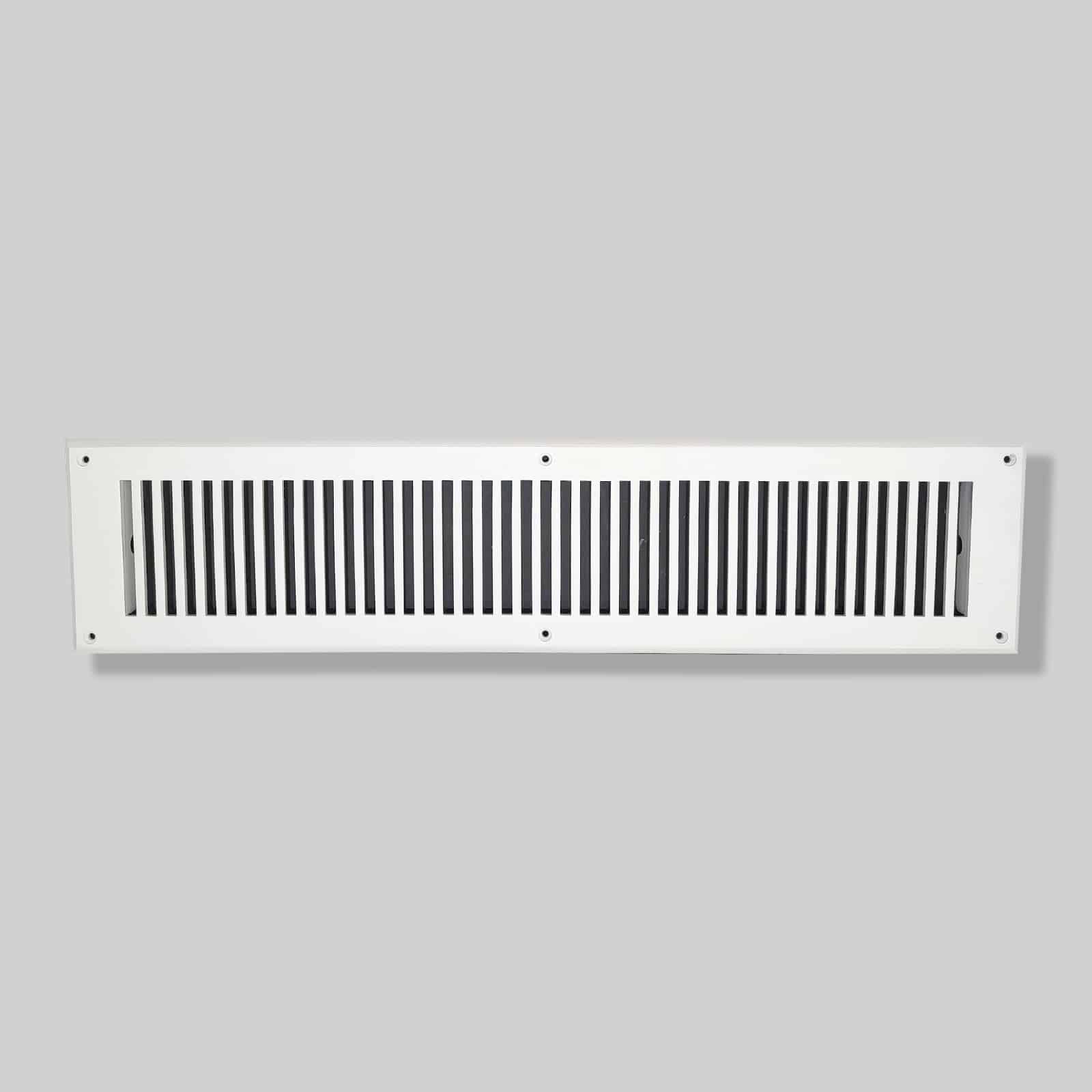 A rectangular white cast aluminum air vent cover by Prima Decorative Hardware features evenly spaced vertical slats and is secured with four screws on a gray wall, making it a durable choice for air return grills.