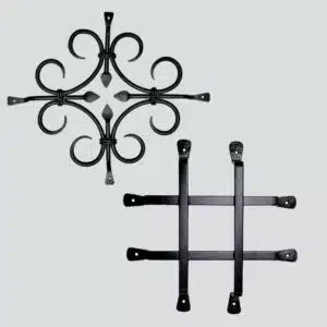 Two black wrought iron decorative pieces on a light gray background; the top piece features ornate scrollwork, while the bottom piece has a simple grid design with four horizontal and vertical bars.
