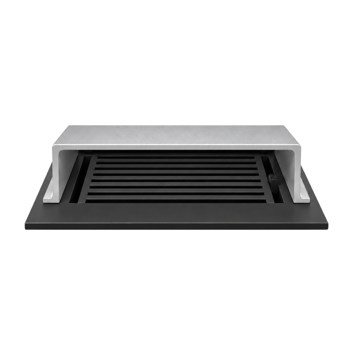A silver deflector sand cast type installed in a floor register in a white background
