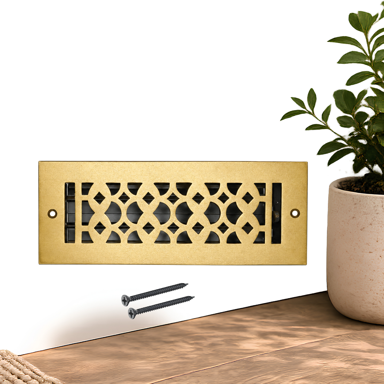 Brushed gold floor register with holes and screws
