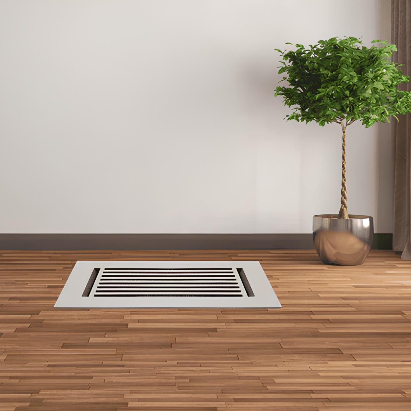 Ventilation grille on a wooden floor with a potted plant in the background