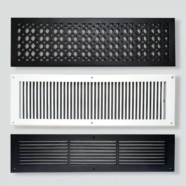 Three rectangular air vent covers are mounted on a wall: the top is black with a geometric pattern, the middle is white with vertical slats, and the bottom is black with horizontal slats.